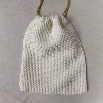 Produit OEM/ODM Accepté Sac de stockage cosmétique en tissu de gaufre vierge pour les besoins de soins de la peau