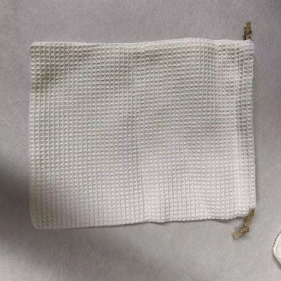 Produit OEM/ODM Accepté Sac de stockage cosmétique en tissu de gaufre vierge pour les besoins de soins de la peau