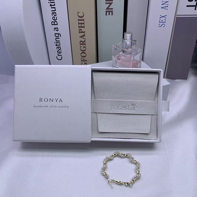 Logo personnalisé sac à oreille de bijoux en suède avec boîte et coussin d'insertion OEM / ODM acceptable