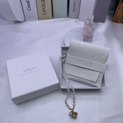 Logo personnalisé sac à oreille de bijoux en suède avec boîte et coussin d'insertion OEM / ODM acceptable