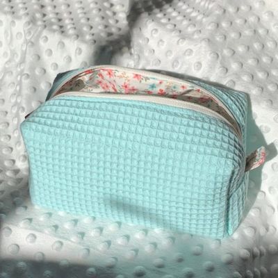 2024 Beauté personnalisée maquillage floral sac cosmétique avec conception de gaufre et fermeture à glissière