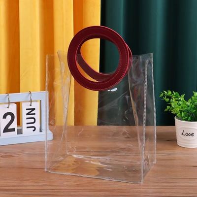 Logo personnalisé Accepté PVC sac à dos en plastique transparent avec poignée de découpe sous pression