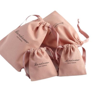 Aménagement de magasinage moyen Sacs à cordes en toile douce rose imprimés en lin de coton