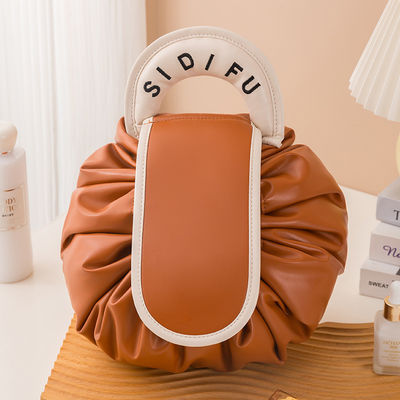 Logo personnalisé Design sac de maquillage en PVC modèle solide type de la corde à dessin toilette sac de voyage