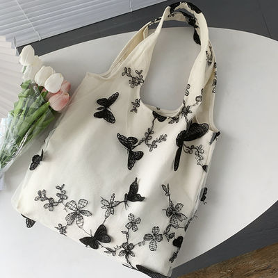 Matériau de doublure en polyester unisexe Version coréenne Sac à épaule de vache avec imprimé papillon