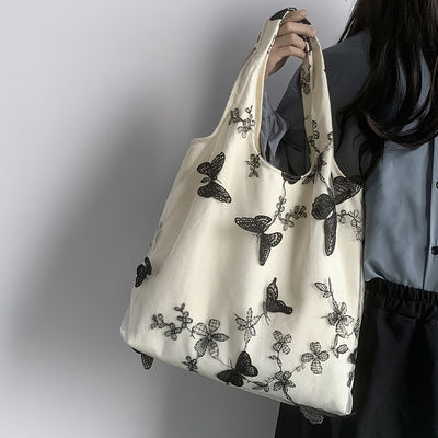 Matériau de doublure en polyester unisexe Version coréenne Sac à épaule de vache avec imprimé papillon