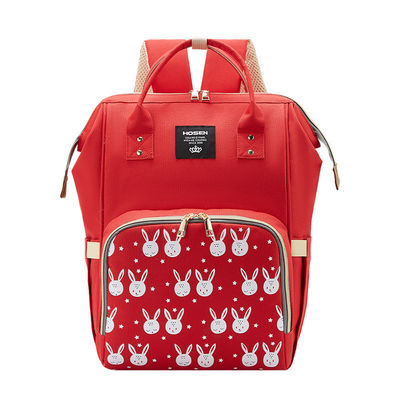 Un sac à dos confortable, un sac à dos de maman, un sac à couches pour bébé, avec un matériau résistant à l'eau