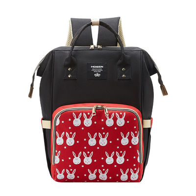 Un sac à dos confortable, un sac à dos de maman, un sac à couches pour bébé, avec un matériau résistant à l'eau