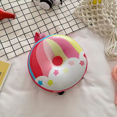 Nouveauté Sac à livres mignon 2024 Sac à dos dessin animé Donuts Sac scolaire en caoutchouc pour la vie quotidienne