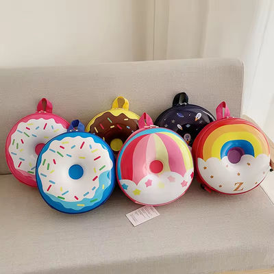 Nouveauté Sac à livres mignon 2024 Sac à dos dessin animé Donuts Sac scolaire en caoutchouc pour la vie quotidienne