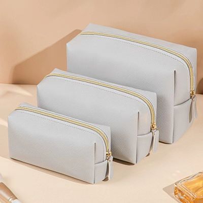 Fermeture à fermeture à glissière Sac de toilette en cuir végétalien en couleur personnalisée pour les voyages et les cosmétiques