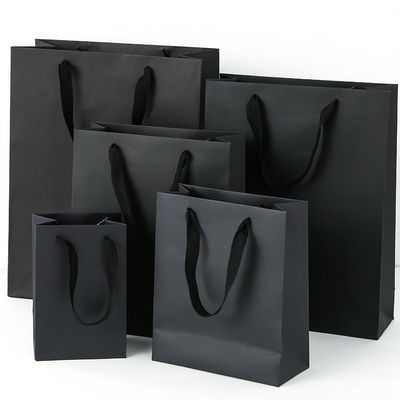 Logo imprimé personnalisé Boutique de luxe Boutique de magasinage Sacs-cadeaux en papier Emballage cadeau personnalisé