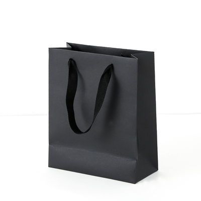 Logo imprimé personnalisé Boutique de luxe Boutique de magasinage Sacs-cadeaux en papier Emballage cadeau personnalisé