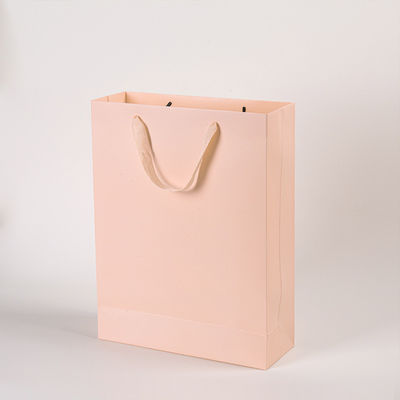 Logo imprimé personnalisé Boutique de luxe Boutique de magasinage Sacs-cadeaux en papier Emballage cadeau personnalisé