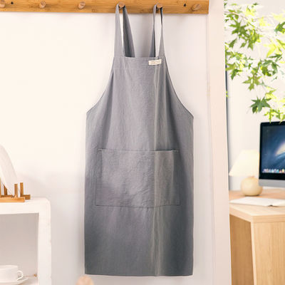 Des tabliers en toile de coton sur mesure avec poche pour la maison