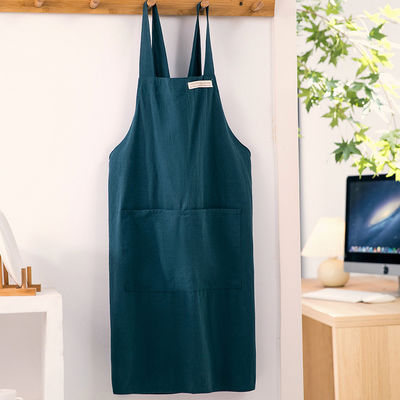 Des tabliers en toile de coton sur mesure avec poche pour la maison