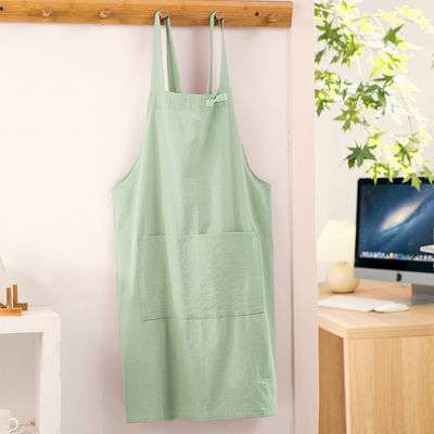 Des tabliers en toile de coton sur mesure avec poche pour la maison