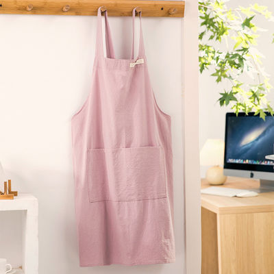 Des tabliers en toile de coton sur mesure avec poche pour la maison