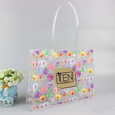 Sac à dos en PVC de couleur personnalisé pour les besoins d'achat à la mode et clairs