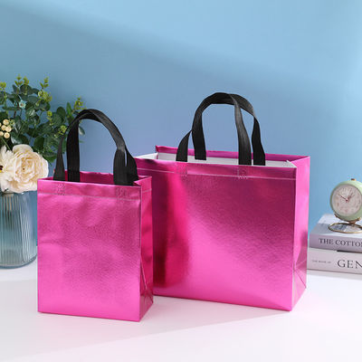 Sac de magasinage laminé non tissé de couleur personnalisée avec couleur dorée et longueur de poignée