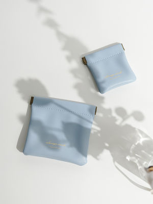 Logo personnalisé Imprimer petit sac de rangement en cuir en PU avec motif de lettre et logo personnalisé