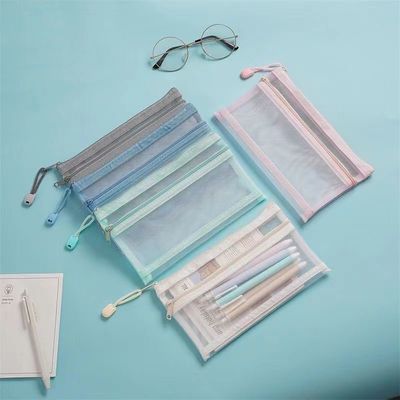 La vie quotidienne de l'école Sacs en maille personnalisés Sacs de maquillage Organisation de voyages cosmétiques Sacs de rangement