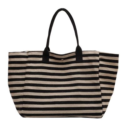 Restez à la mode et organisé avec ce sac à dos en toile pour femme
