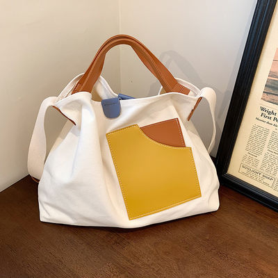 2023 Design Sense Sac de vêtements pour femmes Logo personnalisé Accepté Matériau de revêtement de toile