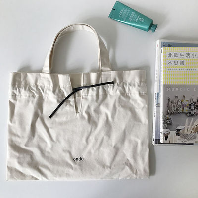 Matériau de revêtement en polyester Logo personnalisé Imprimé en lin de coton toile de dessin à corde sac à main