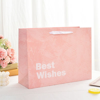 Logo imprimé personnalisé Boutique de luxe Sacs-cadeaux en papier pour emballage