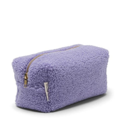 Un sac cosmétique en peluche de plusieurs couleurs, un sac de maquillage en velours de Teddy pour les déplacements.
