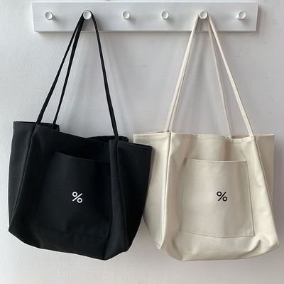Sac à dos en toile écologique de couleur personnalisée pour femmes Grande capacité et OEM / ODM acceptable