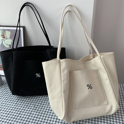 Sac à dos en toile écologique de couleur personnalisée pour femmes Grande capacité et OEM / ODM acceptable