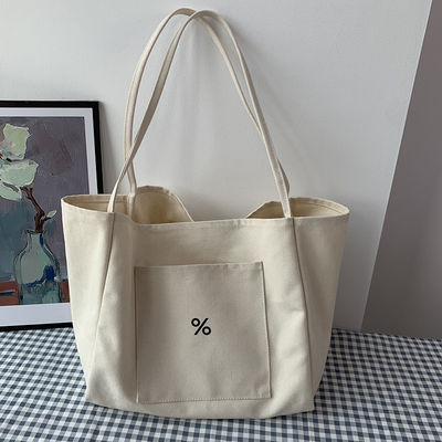 Sac à dos en toile écologique de couleur personnalisée pour femmes Grande capacité et OEM / ODM acceptable