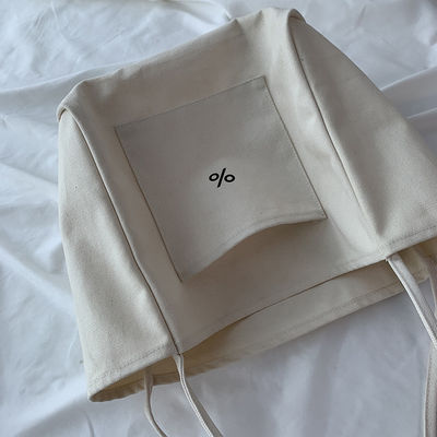 Sac à dos en toile écologique de couleur personnalisée pour femmes Grande capacité et OEM / ODM acceptable
