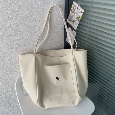 Sac à dos en toile écologique de couleur personnalisée pour femmes Grande capacité et OEM / ODM acceptable