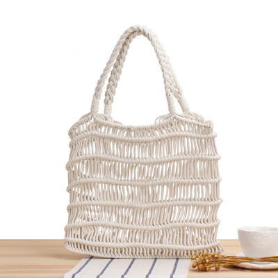 Couleur personnalisée L'été 2022 Sacs à main de paille pour femmes à la main creux sac à main de plage tissé