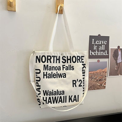 Derniers modèles de sacs à dos en toile pour femmes avec poignée et motif de lettre
