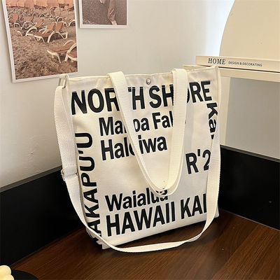 Derniers modèles de sacs à dos en toile pour femmes avec poignée et motif de lettre