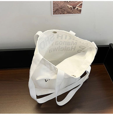Derniers modèles de sacs à dos en toile pour femmes avec poignée et motif de lettre