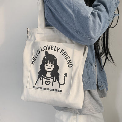 Sac d'épaule en toile personnalisé avec ceinture longue réglable pour les activités quotidiennes de la vie scolaire