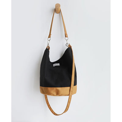 Sac à dos en coton à fond rond pour des achats à la mode et fonctionnels