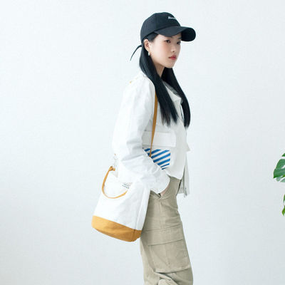 Sac à dos en coton à fond rond pour des achats à la mode et fonctionnels