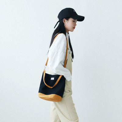 Sac à dos en coton à fond rond pour des achats à la mode et fonctionnels
