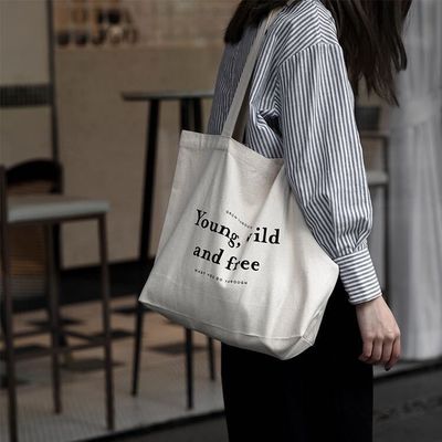 Sacs à dos en coton de couleur personnalisés avec style manipulé et logo de l'entreprise imprimé