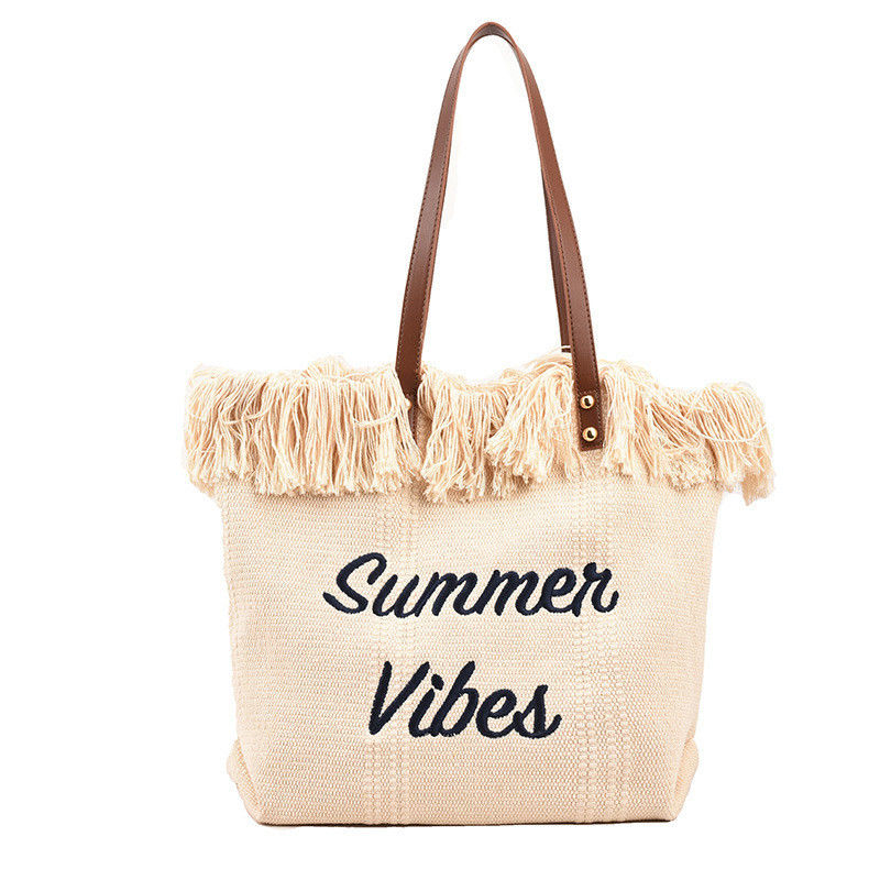 Sac à main en toile de style autruche idéal pour les sorties et les achats d'été.