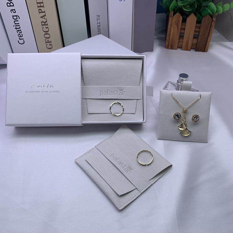 Logo personnalisé sac à oreille de bijoux en suède avec boîte et coussin d'insertion OEM / ODM acceptable