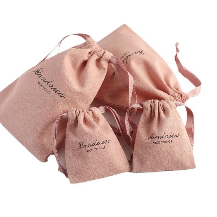 Aménagement de magasinage moyen Sacs à cordes en toile douce rose imprimés en lin de coton