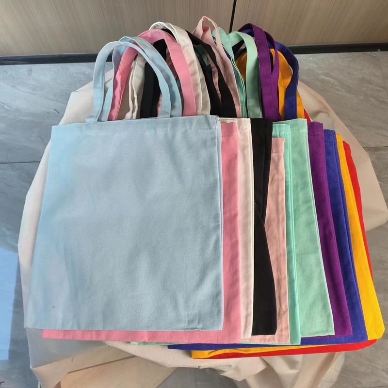 Matériau de revêtement Tissu chaud recyclé Sac de magasinage en coton publicitaire Sac à main pour la promotion