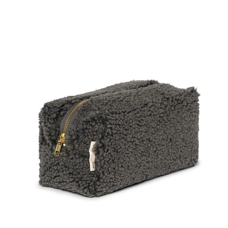 Un sac cosmétique en peluche de plusieurs couleurs, un sac de maquillage en velours de Teddy pour les déplacements.